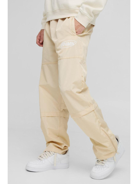 Розслаблені нейлонові фірмові штани з еластичною талією