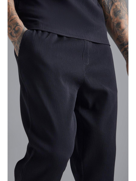 Приталені плісировані штани