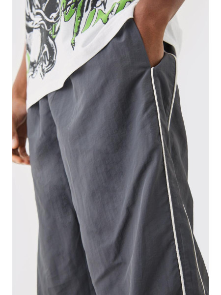 Парашутні штани з бічними смужками на талії на резинці