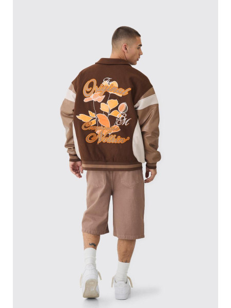 Велика коричнева університетська куртка з квітковим значком і коміром