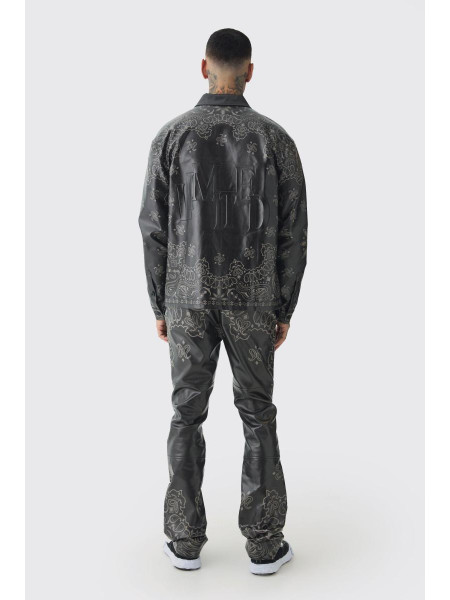 Високі чорні штани з поліуретанової бандани з кльошом і принтом