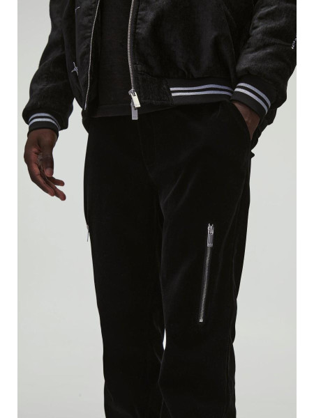 Велюрові вузькі жорсткі брюки з фіксованою талією