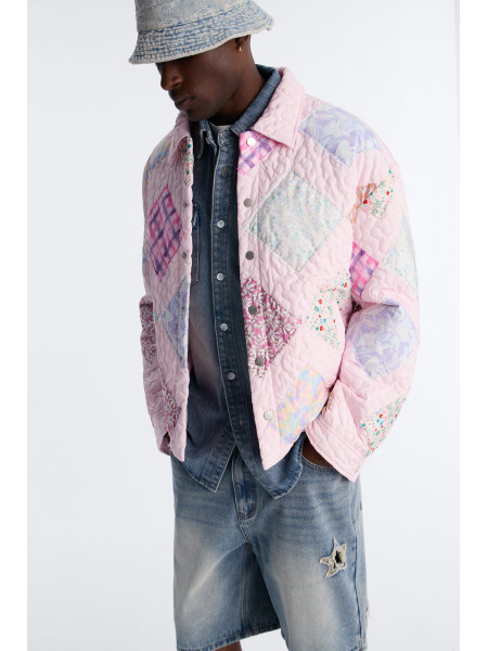 Стьобана укорочена куртка з клаптиками