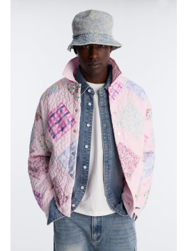 Стьобана укорочена куртка з клаптиками