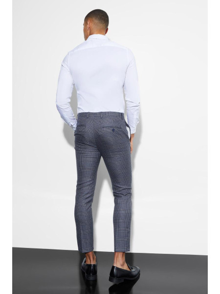 Укорочені костюмні брюки в клітку