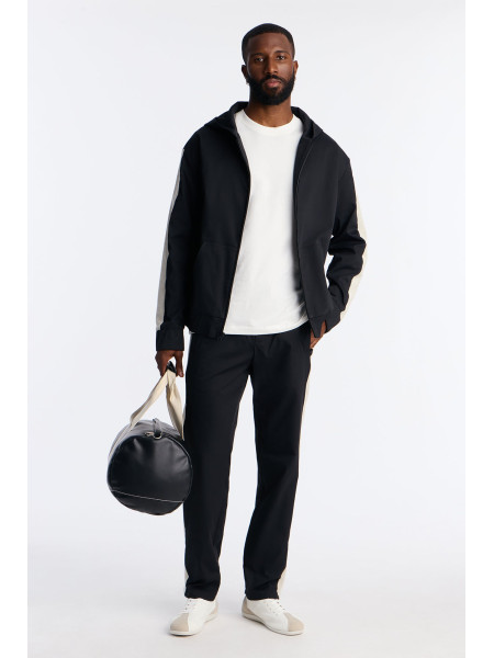 Трикотажна куртка-бомбер на блискавці з капюшоном