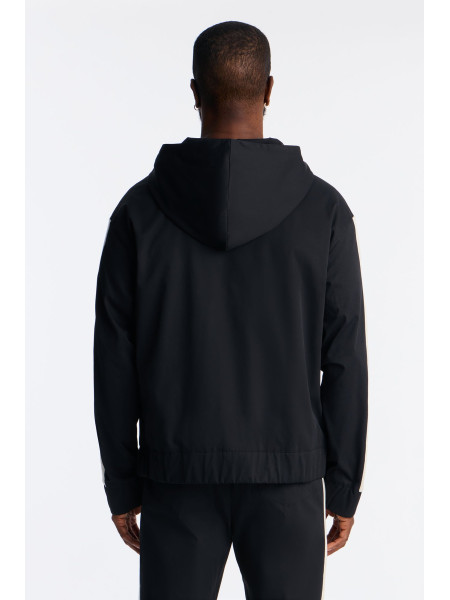 Трикотажна куртка-бомбер на блискавці з капюшоном