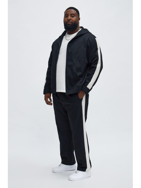 Трикотажна куртка-бомбер на блискавці з капюшоном